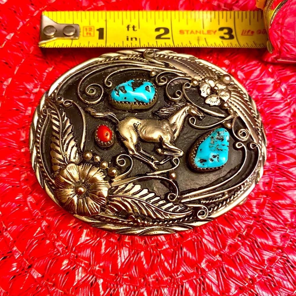 Vintage Native American belt buckle.With turquoise,coral and mustang